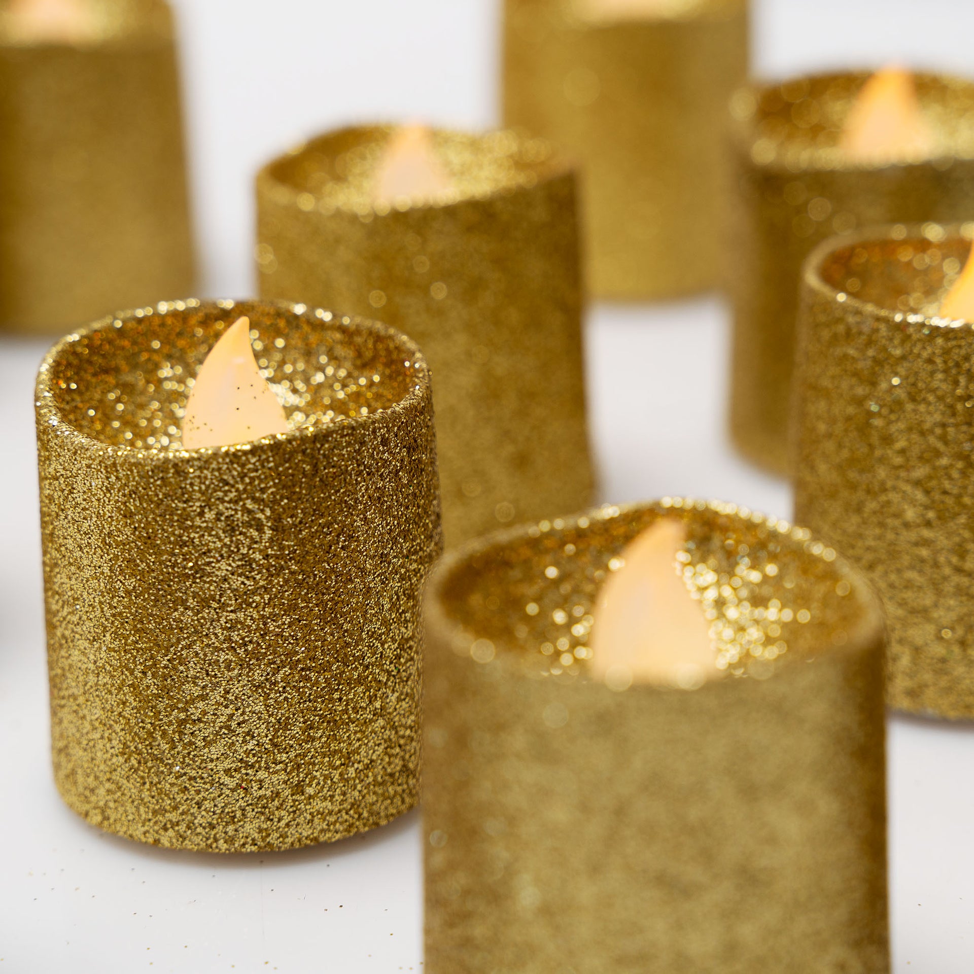 LED Gold Glitter Tea Light Flameless Faux Wax Candles 12 Pack - West Ivory LED Lighting 